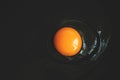 Raw egg with yellow egg broken into a frying pan Royalty Free Stock Photo