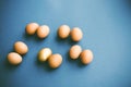 Raw eggs on blue background Royalty Free Stock Photo