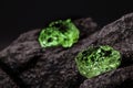 Raw emerald gem in rare stone mine, bright green stone Royalty Free Stock Photo