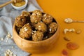 Raw energy balls. Candy vegan balls of dates, raisins, almonds, cashews, dried apricots, oatmeal Royalty Free Stock Photo