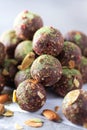 Raw energy balls with matcha tea powder on grey background. Raw vegan, vegetarian sweets. Sugar free, gluten free Royalty Free Stock Photo