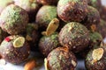 Raw energy balls with matcha tea powder on grey background. Raw vegan, vegetarian sweets. Sugar free, gluten free Royalty Free Stock Photo