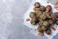 Raw energy balls with matcha tea powder on grey background. Raw vegan, vegetarian sweets. Sugar free, gluten free Royalty Free Stock Photo