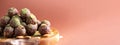 Raw energy balls with matcha tea powder on wooden board on beige background. Raw vegan, vegetarian sweets. Sugar free Royalty Free Stock Photo