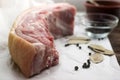 Raw fat pork belly on white paper. Royalty Free Stock Photo