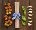 Raw fettucce pasta, basil and vegetables Royalty Free Stock Photo