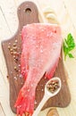 Raw fish on board Royalty Free Stock Photo
