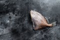 Raw fish John Dory. Black background. Top view. Copy space Royalty Free Stock Photo