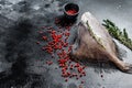 Raw fish John Dory. Black background. Top view. Copy space Royalty Free Stock Photo