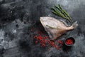 Raw fish John Dory. Black background. Top view. Copy space Royalty Free Stock Photo