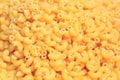 Raw food texture of dry uncooked macaroni pasta