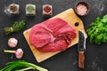 Raw fresh beef top round roast with spice and herbs Royalty Free Stock Photo