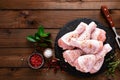 Raw fresh chicken legs on wooden background. Top view Royalty Free Stock Photo