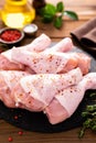 Raw fresh chicken legs on wooden background. Top view Royalty Free Stock Photo