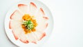 Raw fresh Hamaji fish meat sashimi in white plate