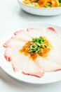 Raw fresh Hamaji fish meat sashimi in white plate