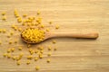 Raw fresh and healthy macaroni pasta on wooden spoon Royalty Free Stock Photo