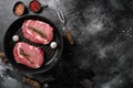 Raw fresh marbled meat Steak Ribeye, on black dark stone table background, top view flat lay, with copy space for text Royalty Free Stock Photo