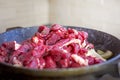 raw fresh meat cut into pieces in a frying pan. Royalty Free Stock Photo