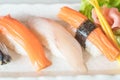 Raw and fresh nigiri sushi in white plate Royalty Free Stock Photo