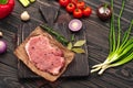 Raw fresh piece of meat with vegetables Royalty Free Stock Photo
