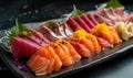 Raw fresh salmon sashimi served on black plate, Japanese food style Royalty Free Stock Photo