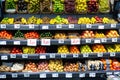 Raw fresh vegetables and fruits assortment on counter Royalty Free Stock Photo