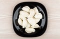 Raw frozen dumplings in plate, top view Royalty Free Stock Photo