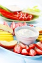 Raw fruits and vegetables with dip Royalty Free Stock Photo