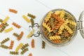 Raw fusilli pasta on a glass jar Royalty Free Stock Photo