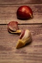 Raw Garlic Cloves On A Wooden Background. Close Up