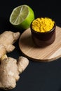 Raw ginger and laim with curcuma seasoning Royalty Free Stock Photo