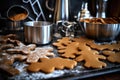 raw gingerbread dough next to metal cookie cutters Royalty Free Stock Photo