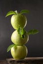 Raw Granny Smith apples. Green fresh fruits on dark background Royalty Free Stock Photo