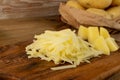 Raw Grated Potato on Wooden Cutting Board Background Royalty Free Stock Photo