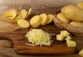 Raw Grated Potato on Wooden Cutting Board Background Royalty Free Stock Photo