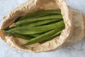 Raw green beans in a brown paper bag. Eco friendly recycling packaging