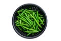 Raw green beans in a colander. Isolated, white background. Top view. Royalty Free Stock Photo