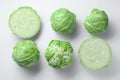 Raw green cabbages on white background, flat lay Royalty Free Stock Photo