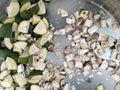 Raw green mango cut pieces for making pickles Royalty Free Stock Photo