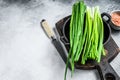 Raw Green onions chives. White background. Top view. Copy space Royalty Free Stock Photo