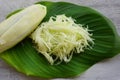 raw green papaya prepared on green leaf