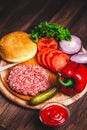 Raw Ground beef meat Burger steak cutlets with seasoning, cheese Royalty Free Stock Photo