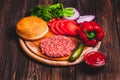 Raw Ground beef meat Burger steak cutlets with seasoning, cheese Royalty Free Stock Photo