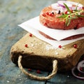 Raw Ground beef meat Burger steak cutlets with seasoning Royalty Free Stock Photo