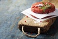 Raw Ground beef meat Burger steak cutlets with seasoning Royalty Free Stock Photo