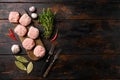 Raw ground beef meat steak cutlets, on old dark  wooden table background, top view flat lay, with copy space for text Royalty Free Stock Photo