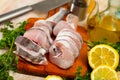 Raw haddock on wooden table