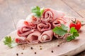 Raw Ham rolls on wooden table Royalty Free Stock Photo