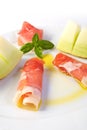 Raw ham and yellow melon Royalty Free Stock Photo